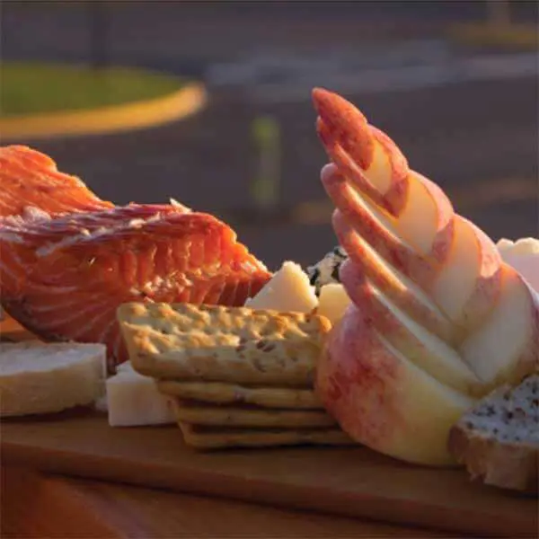 smoked salmon cheese apple cracker appetizer board at voyaguer brewery grand marais