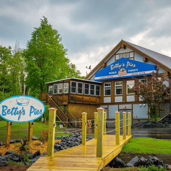 Betty's Pies front lawn after rain and storefront