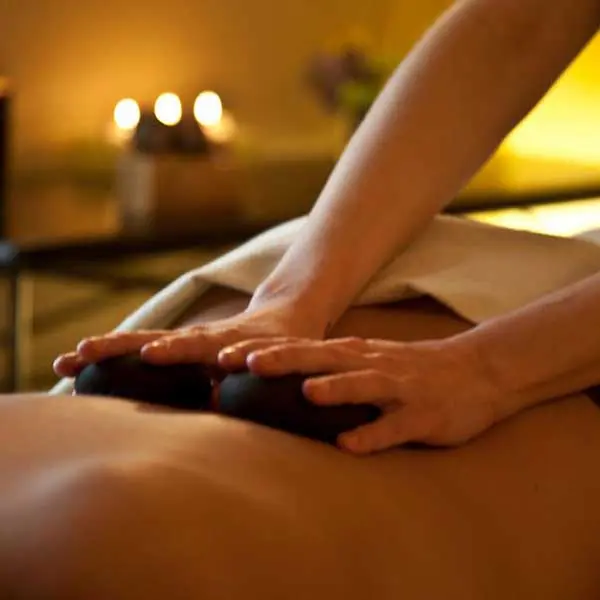 a hot rock massage at waves of superior spa