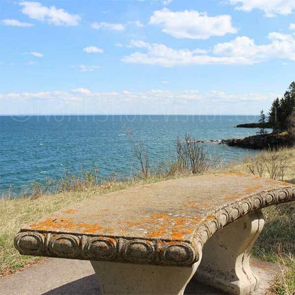 curved concrete bench at burlington bay two harbors lake superior
