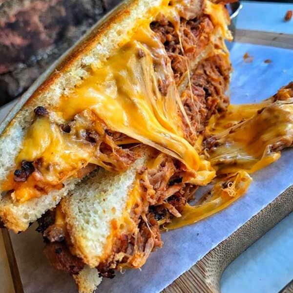 cheese melting out of bbq sandwich from shore happy food truck