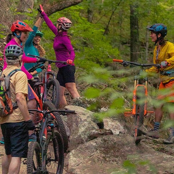 bike riders in sawtooth mountains on the north shore of lake superior