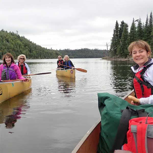 women on a guided canoe tour